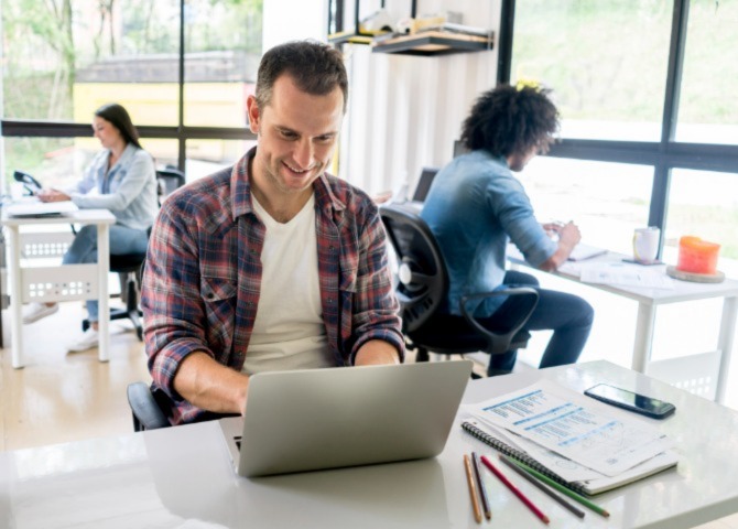 a man taking online cybersecurity training